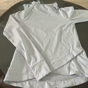 Athletic top-never worn but has a small hole under left arm looks to be a defect